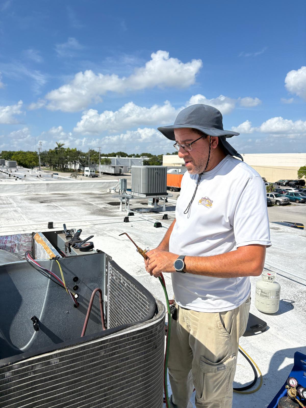 Rooftop brazing on a commercial change-out.